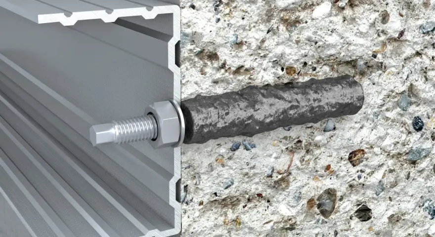 Przekrój kotwy z regulacją w betonie i profilu aluminiowym.